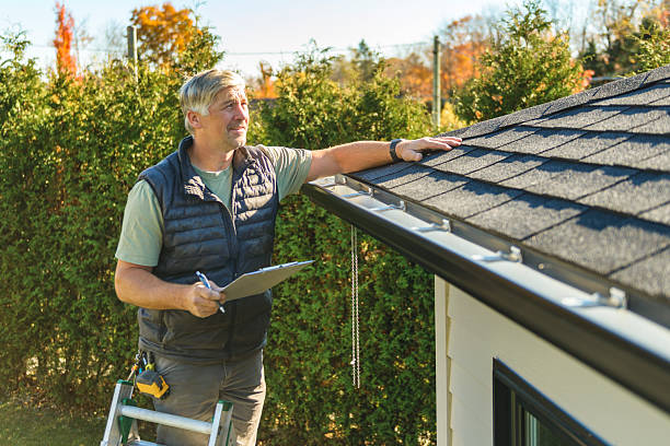 Professional Roofing technician working in Chester, WV